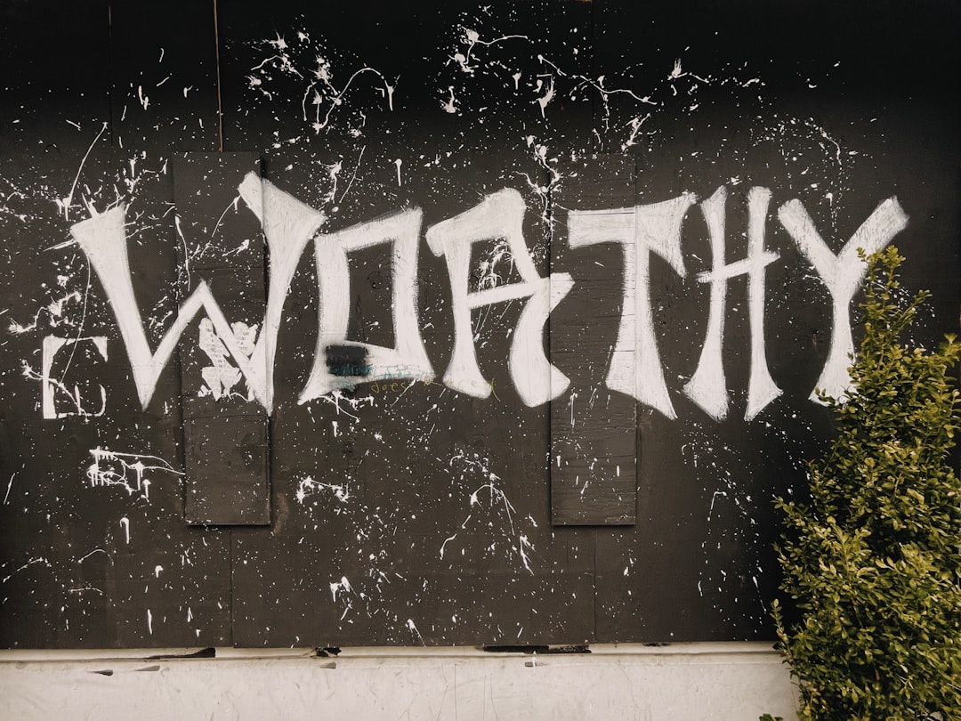 black and white graffiti on wall