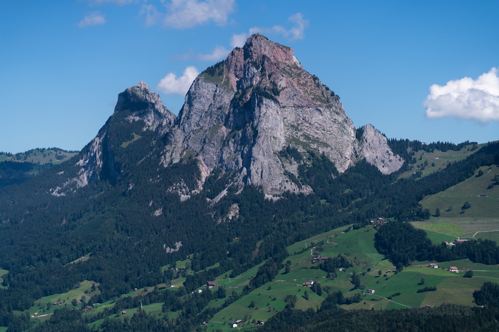 a view of a mountain range with a small village below