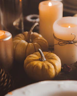 Seasonal candles shaped like pumpkins and snowflakes, perfect for festive moods.