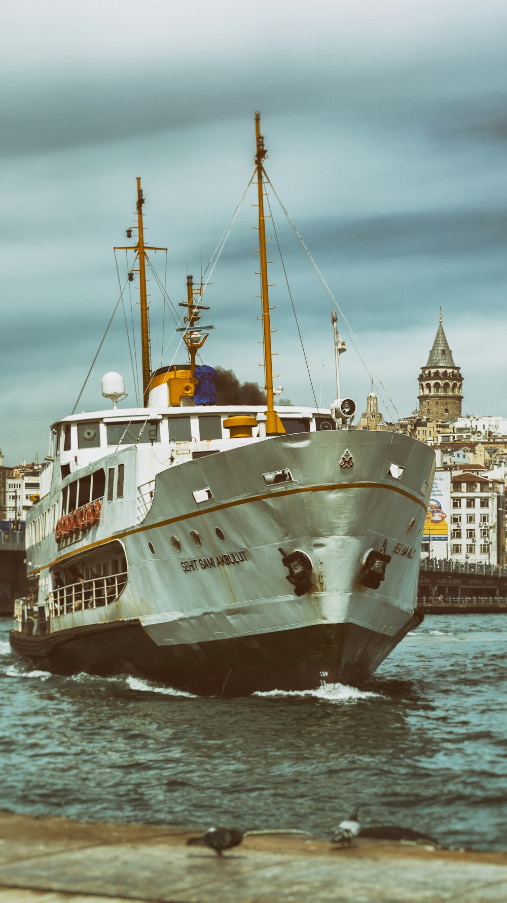 a large white boat in a body of water