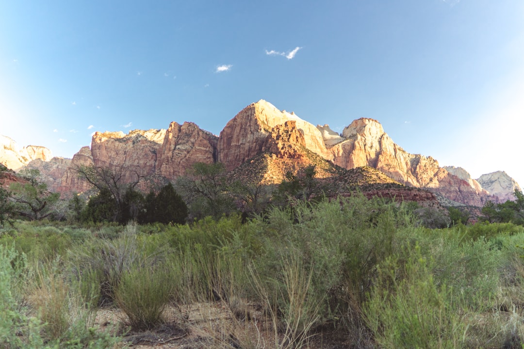 brown rocky mountain under blue sky during daytime