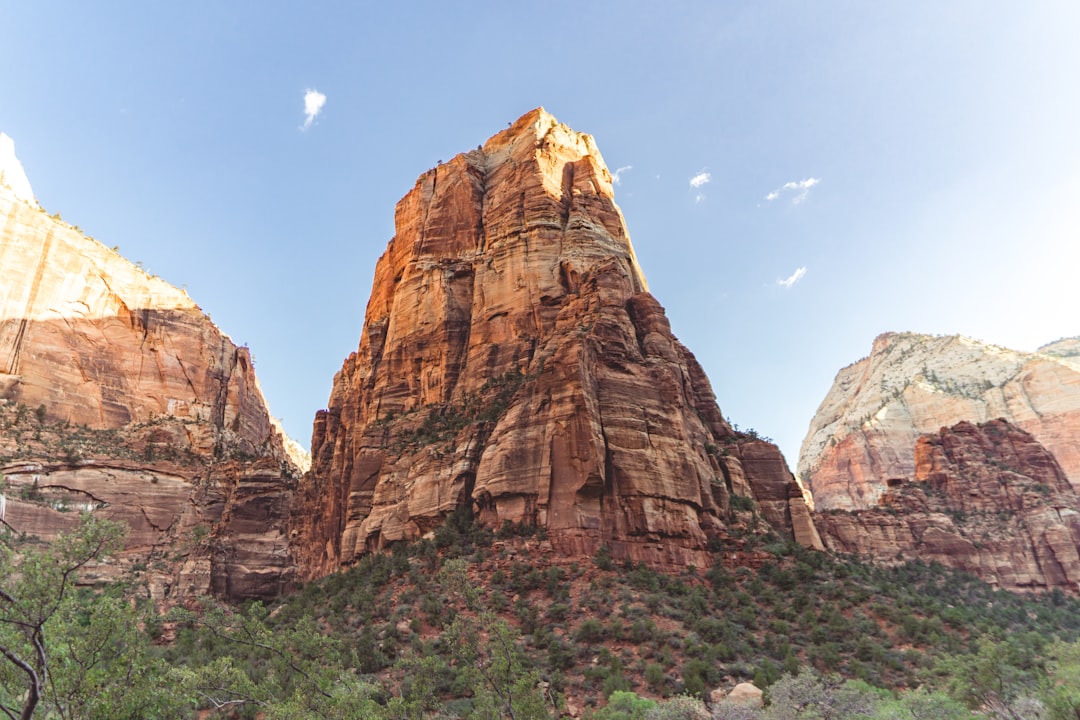 brown rock formation under blue sky during daytime