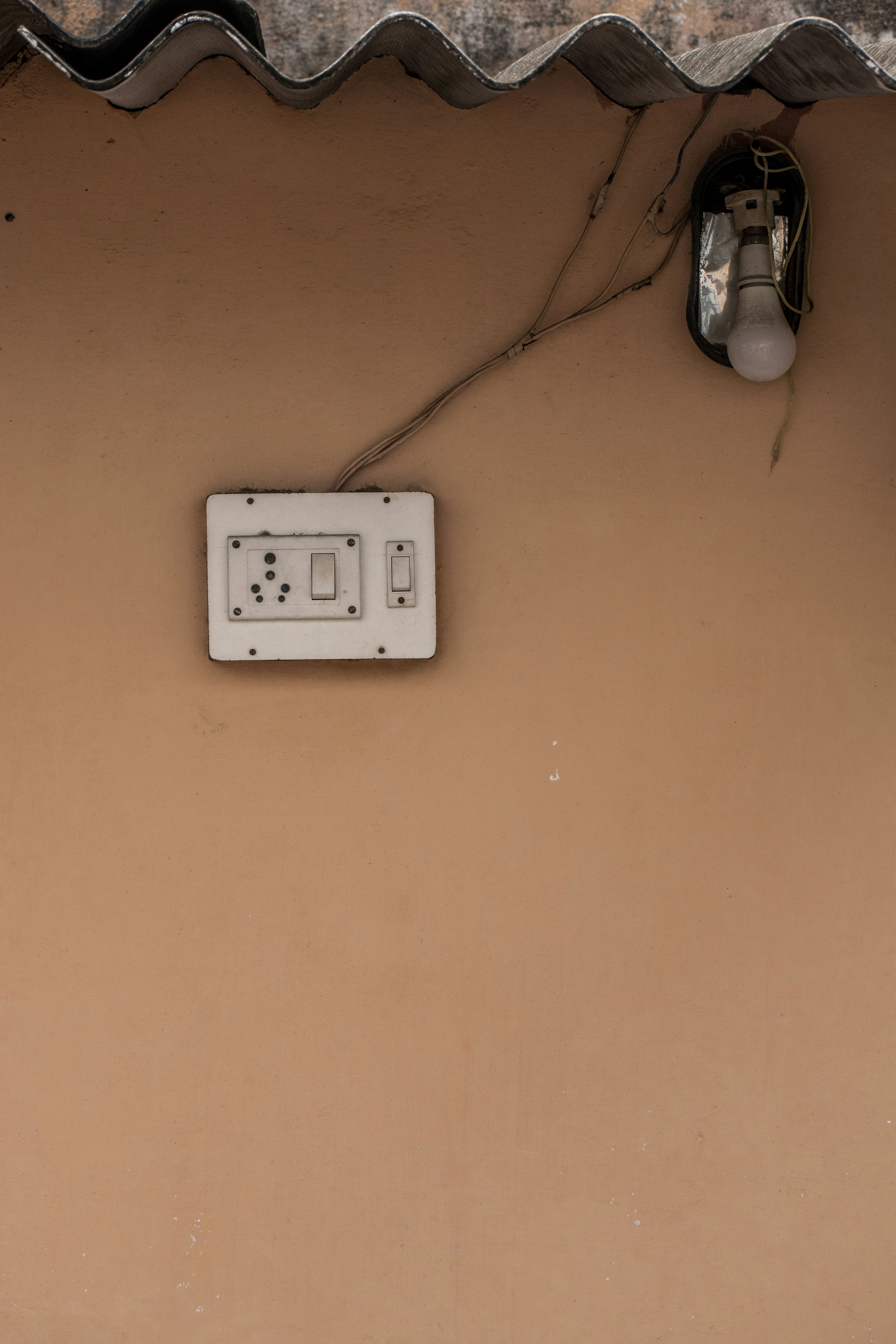 white wall mounted electric socket