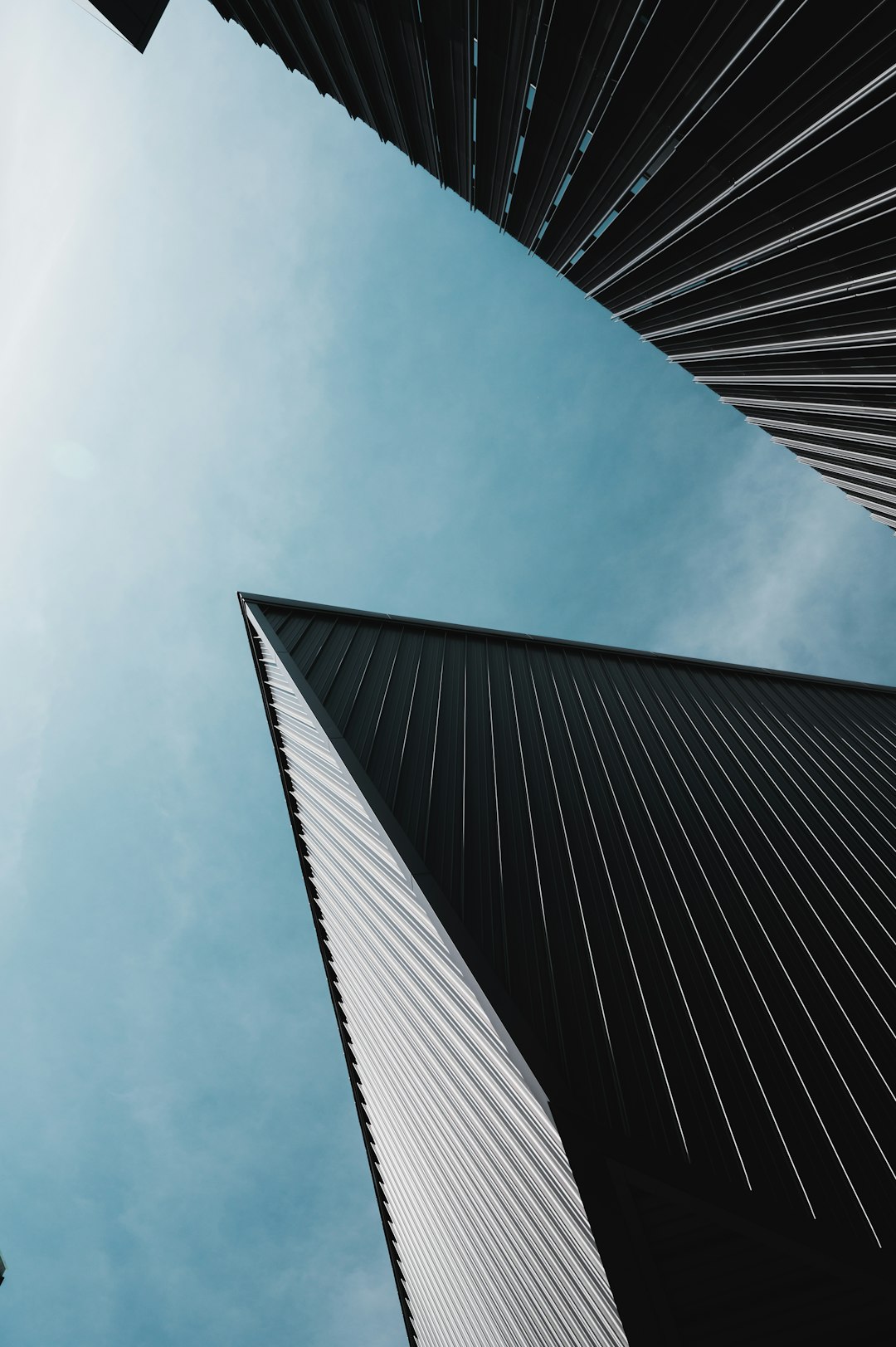 black concrete building under blue sky during daytime