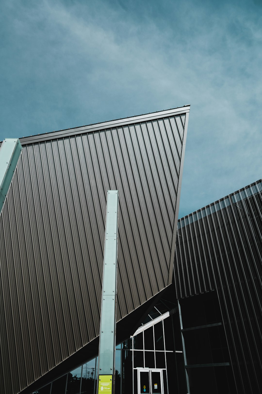 brown and white concrete building under blue sky during daytime