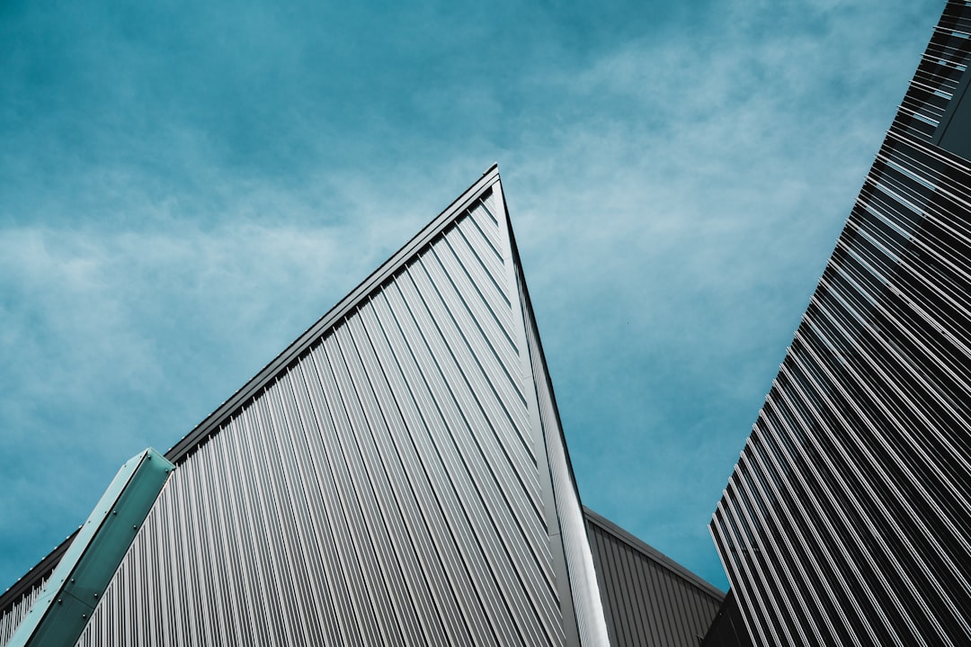 gray concrete building under blue sky during daytime