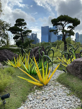 Close-up of decorative artificial rocks enhancing a public park's landscape.