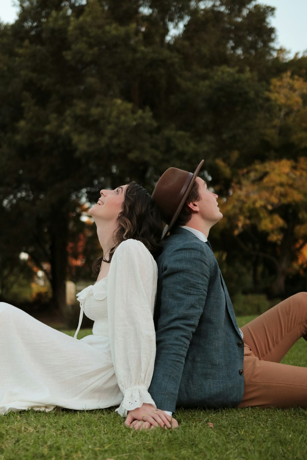 man and woman kissing during daytime