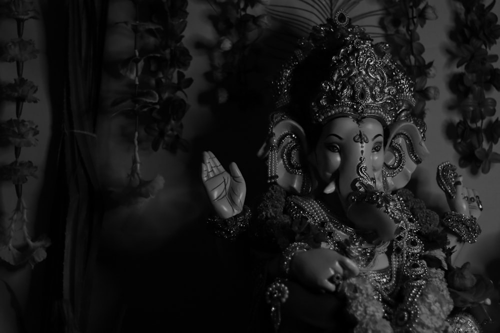 grayscale photo of hindu deity figurine