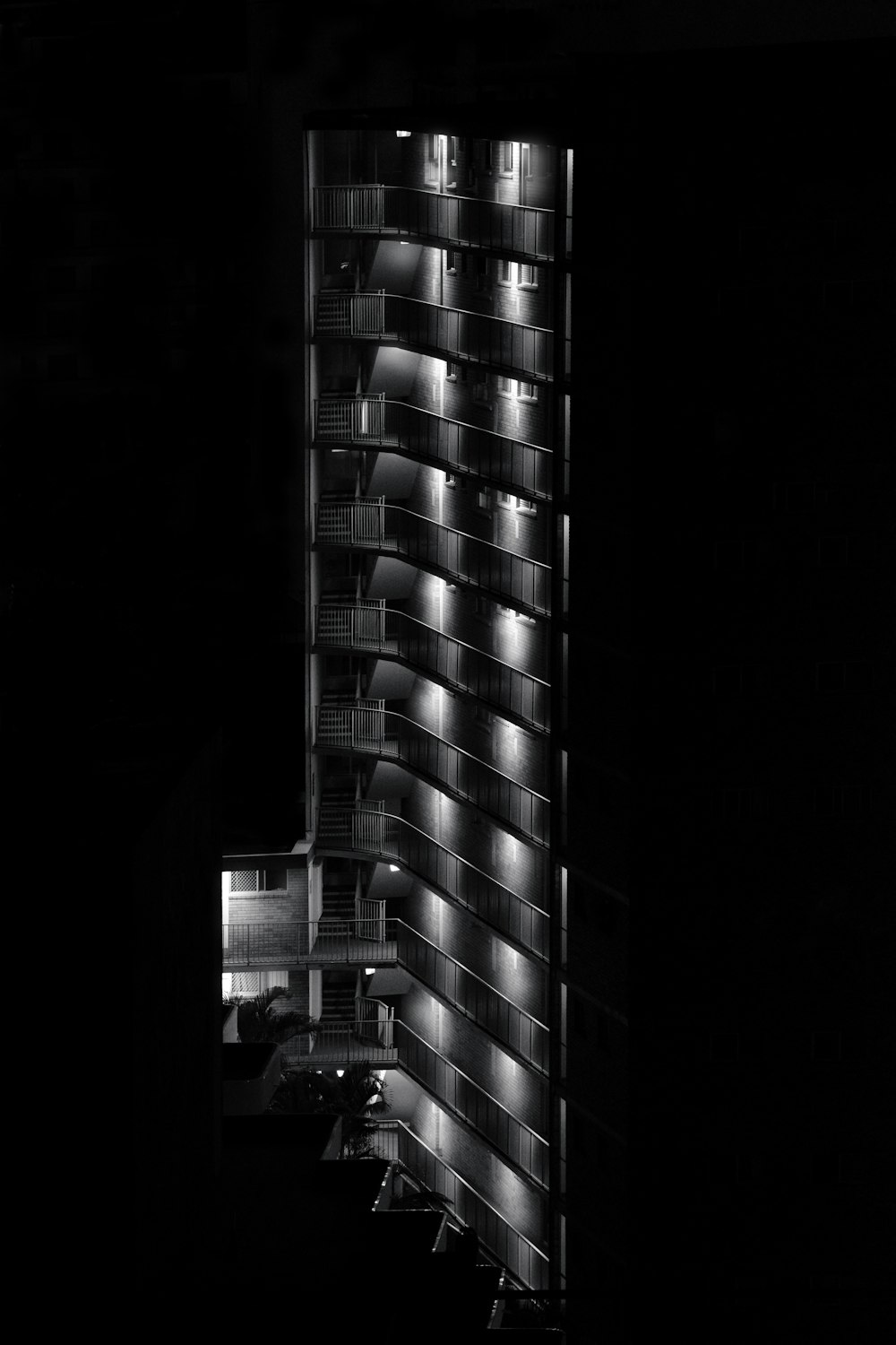 grayscale photo of high rise building