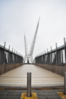 A sturdy, elegant bridge spanning a river, showcasing durable materials and timeless design.