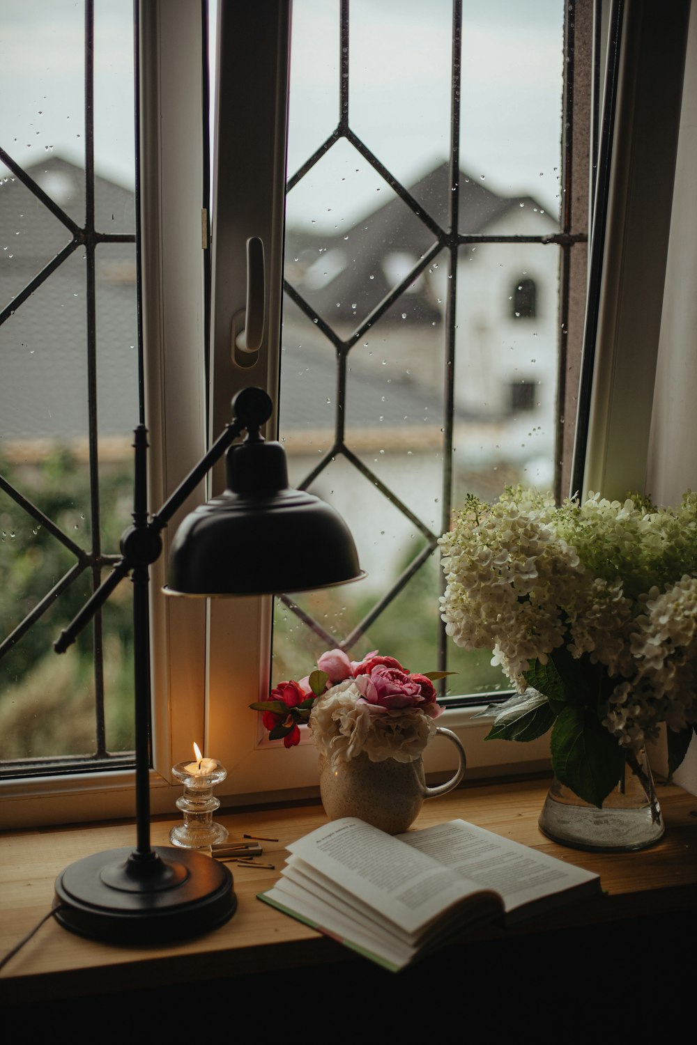 pink and white roses in vase on table