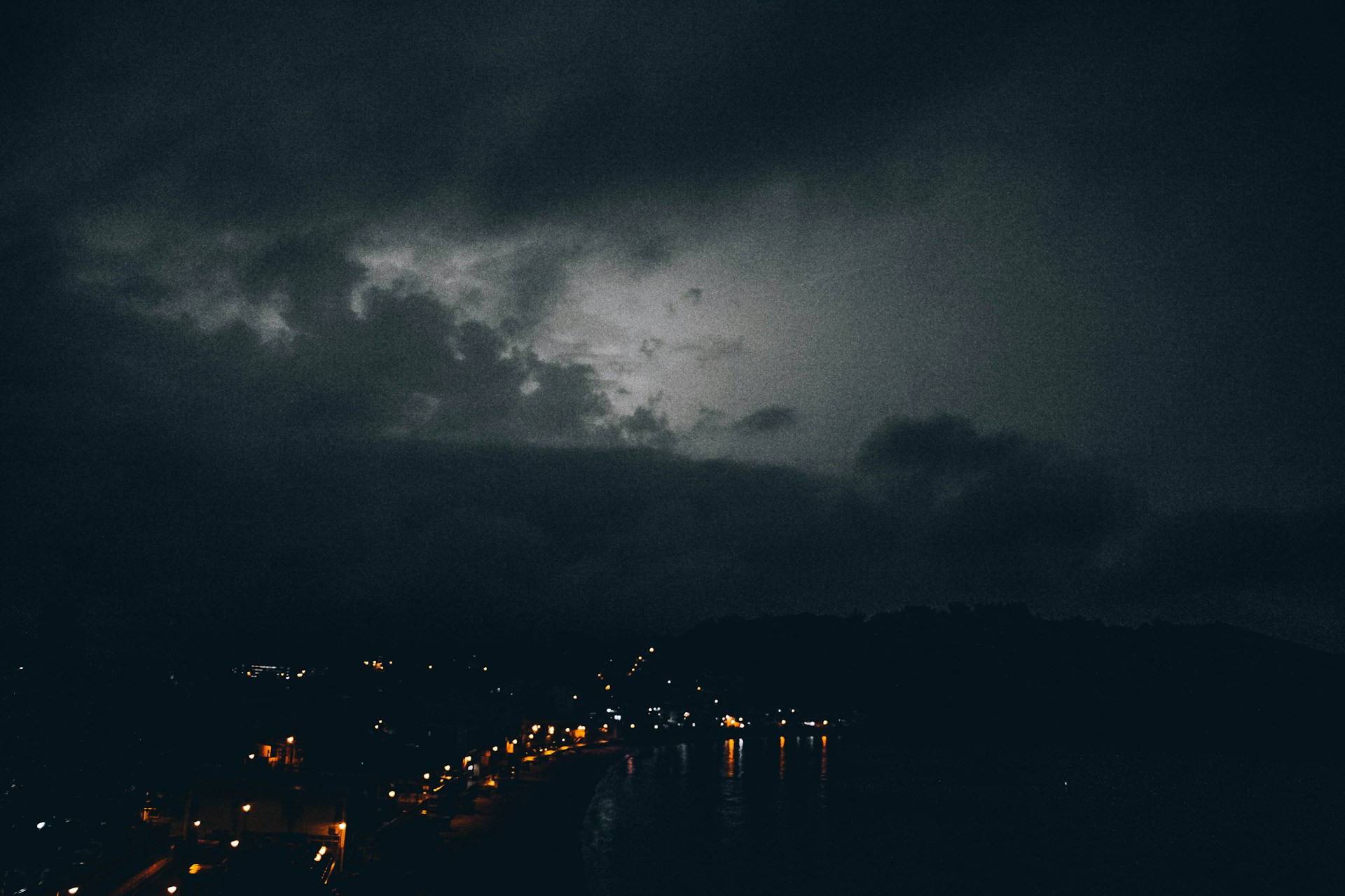 people on beach during night time
