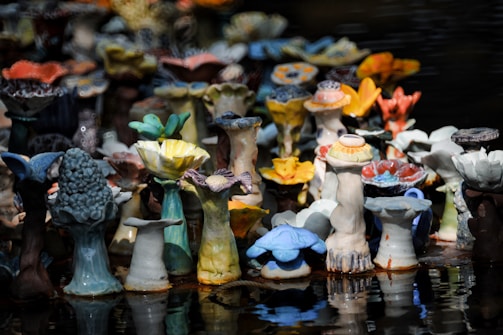 Handcrafted ceramic pieces shaped like strange, organic forms inspired by nature.