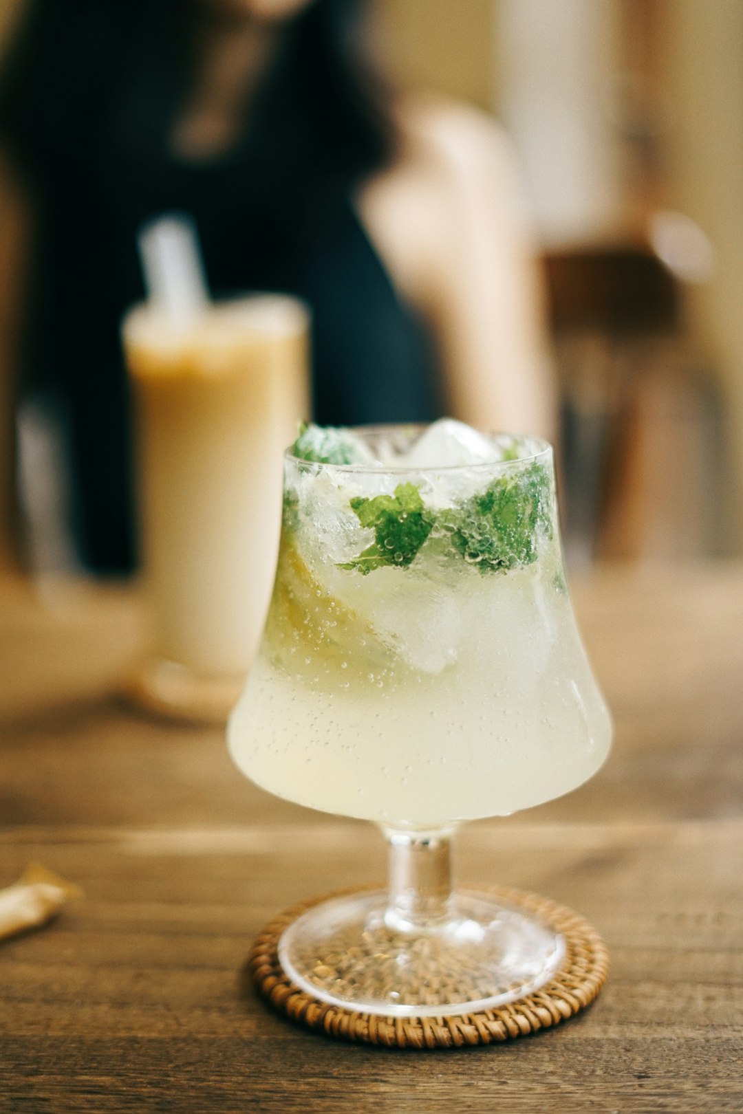 clear drinking glass with white liquid and ice