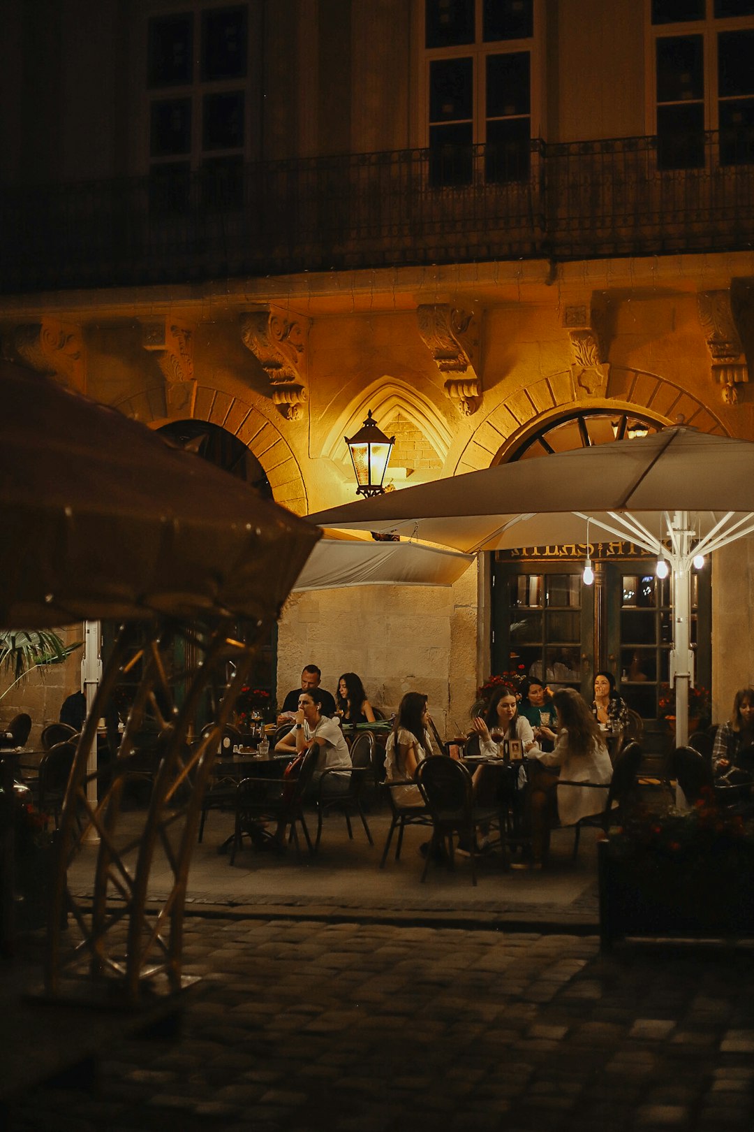 people sitting on chairs inside building