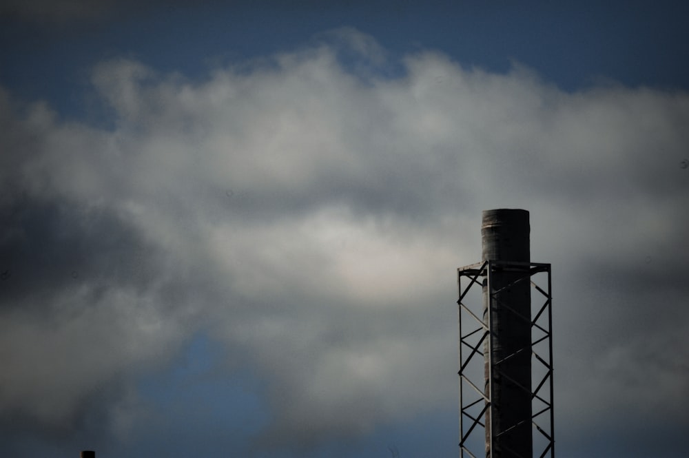 black metal tower under blue sky