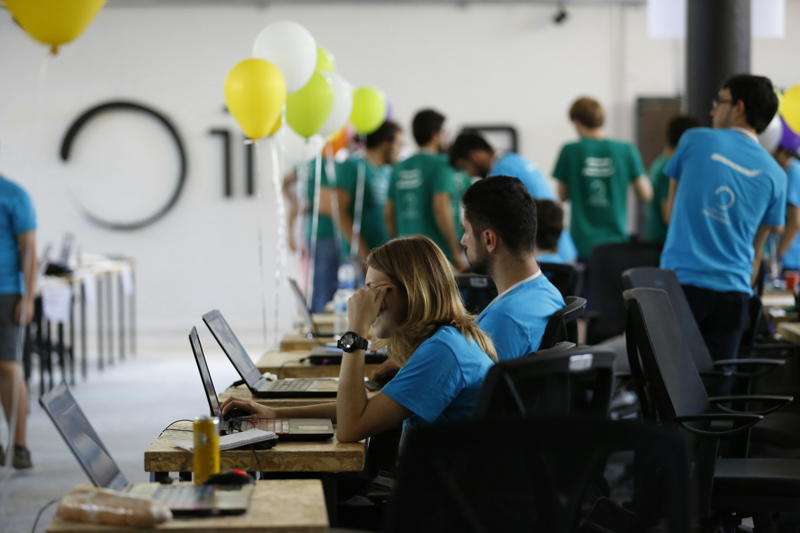 Team of tech startup professionals collaborating on growth strategy