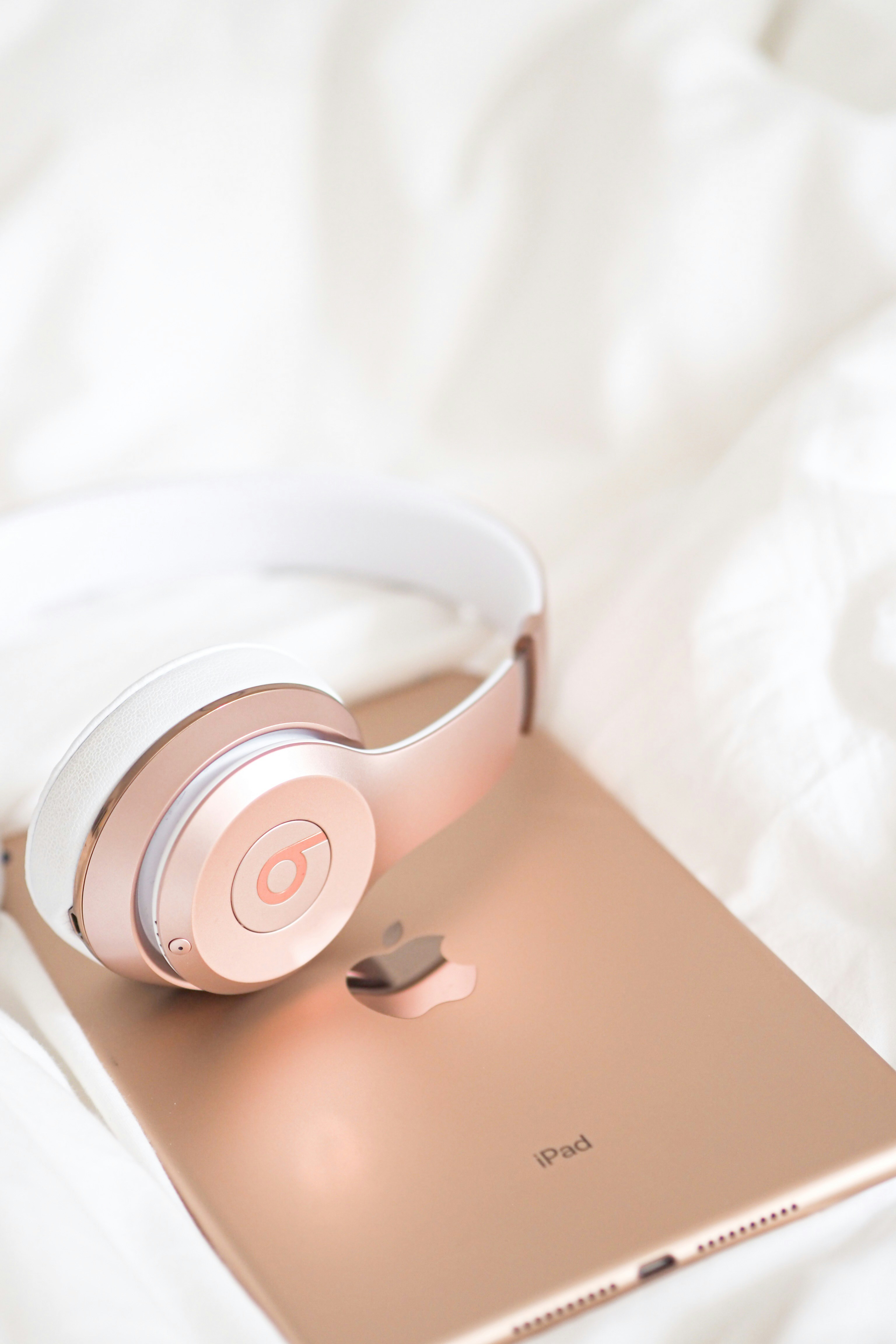 white beats by dr dre headphones photo Free Brown Image on Unsplash