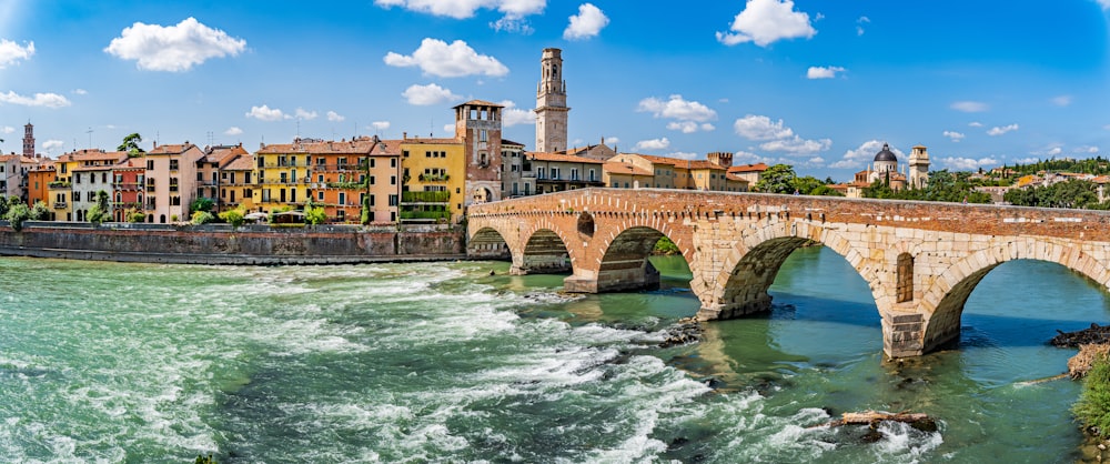 brown concrete bridge over water