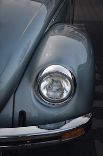 silver car with silver headlight