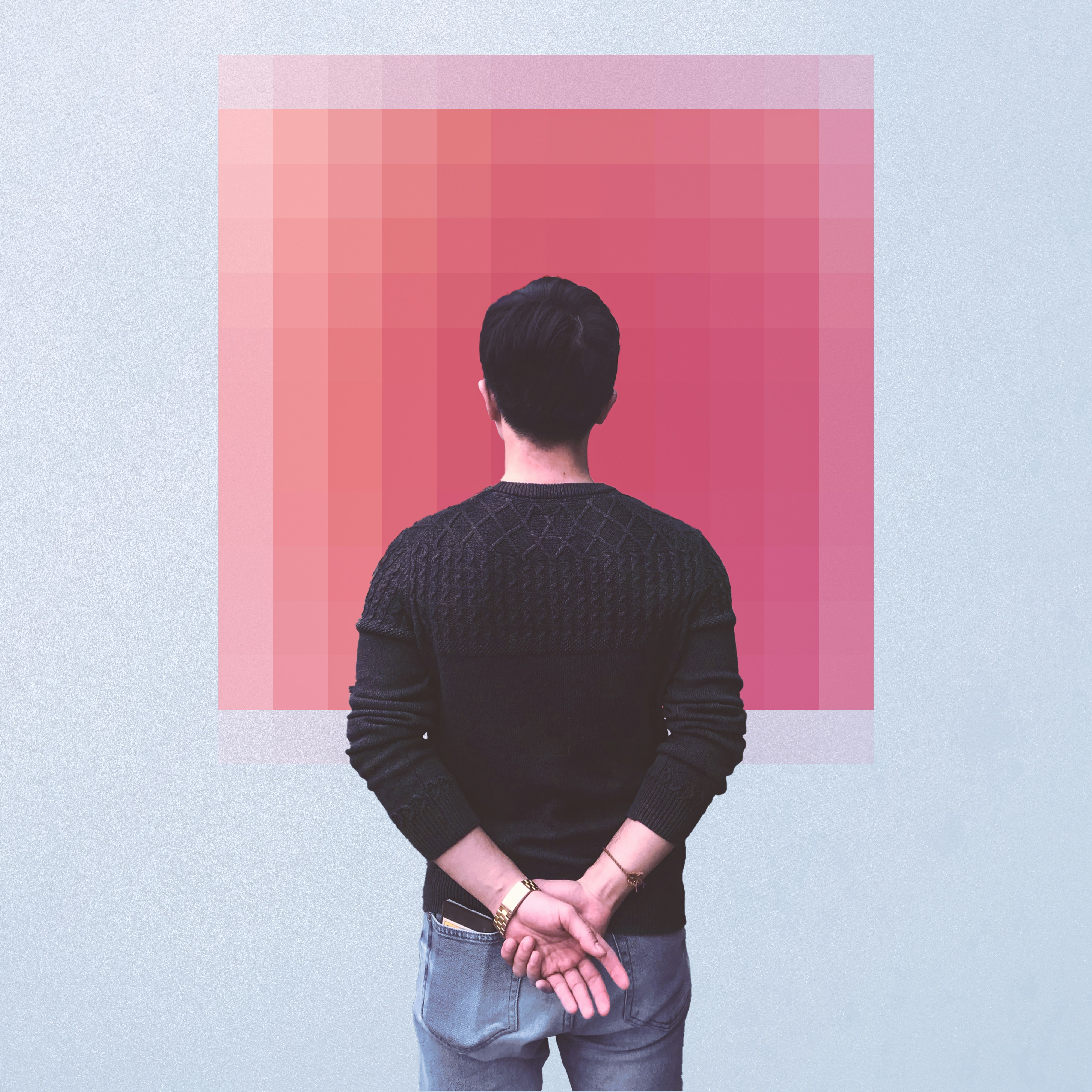 A man standing with his hands in his pockets photo – Free Man Image on ...