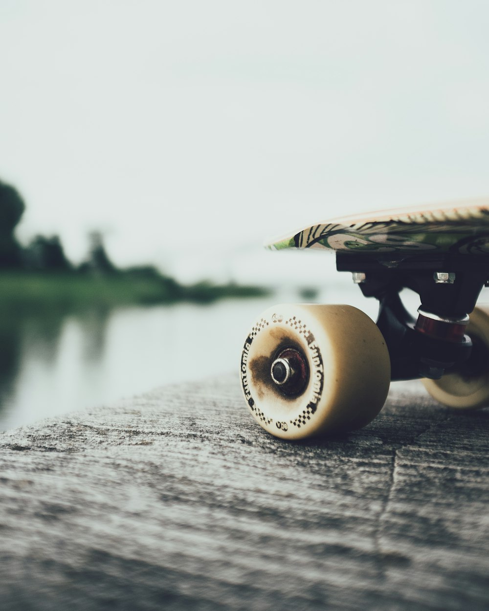 white and black train toy on gray wooden table