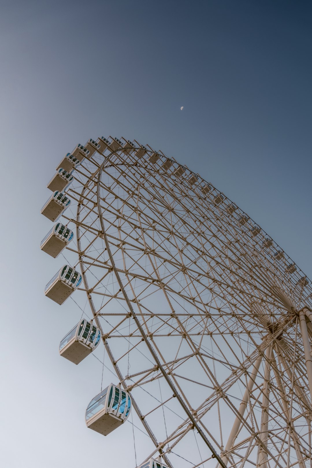 white ferris wheel under blue sky during daytime