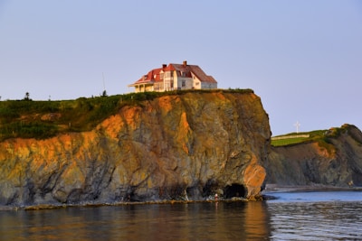 Aerial view showing the house perched on a 30-meter high cliff