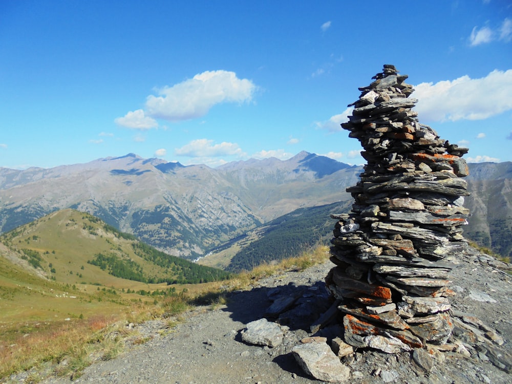 a pile of rocks sitting on top of a mountain
