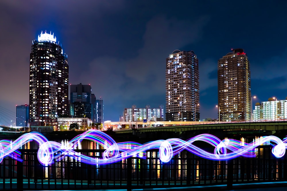 city skyline with lights turned on during night time