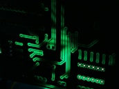 a close up of a computer motherboard in the dark