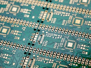 Engineered electrical circuit board with intricate wiring and components.