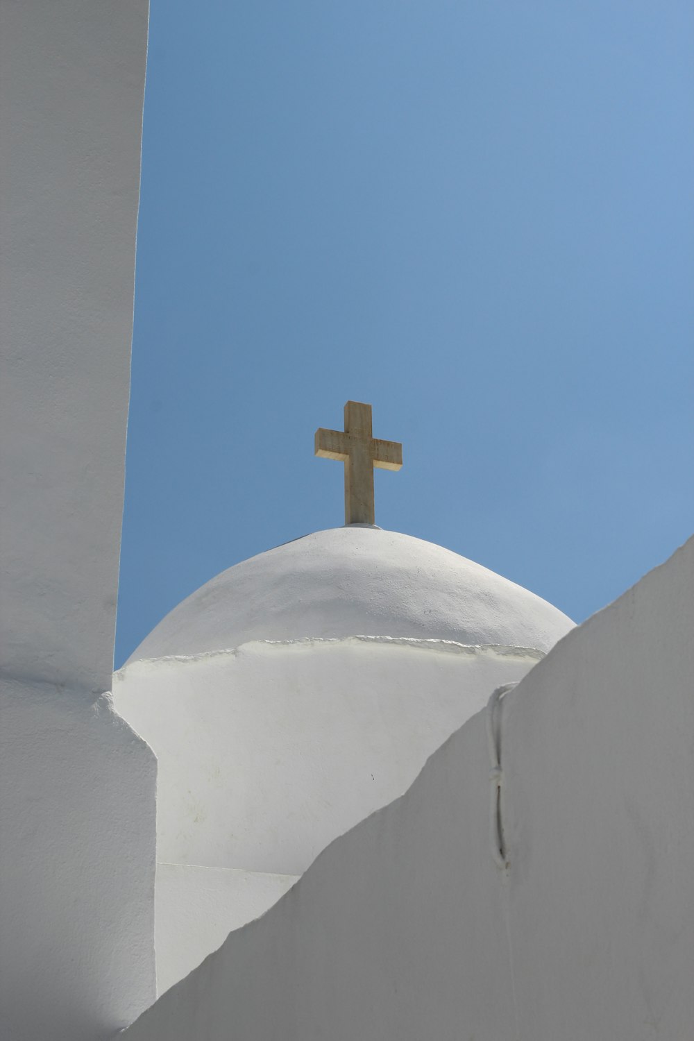 white cross on white textile