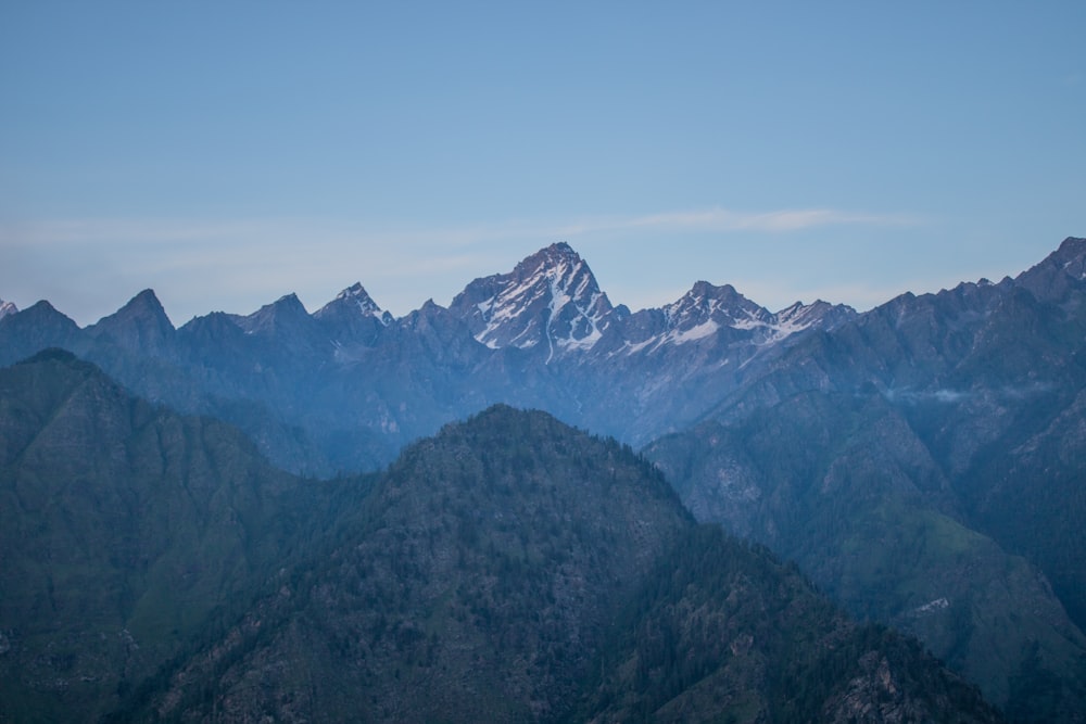 snow covered mountains during daytime