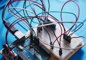 a close up of a board with wires attached to it