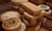 Close-up of assorted fresh dairy products arranged on a wooden table.