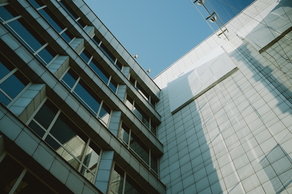 white concrete building under blue sky during daytime