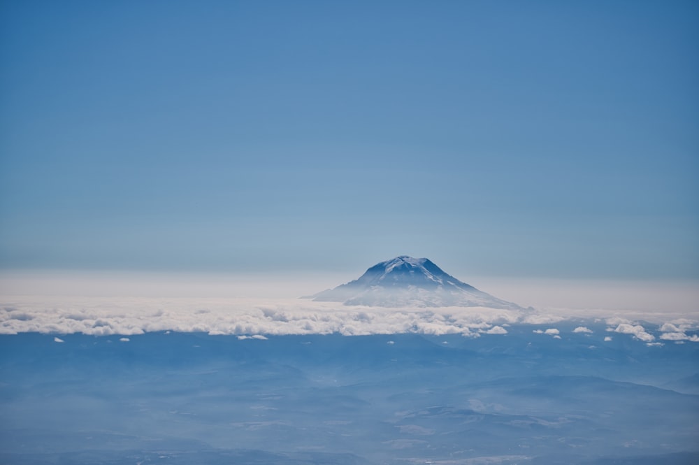 snow covered mountain under blue sky during daytime