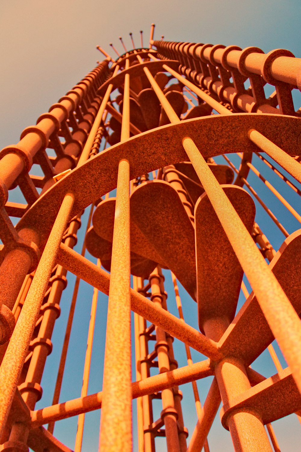 yellow metal spiral ladder during daytime