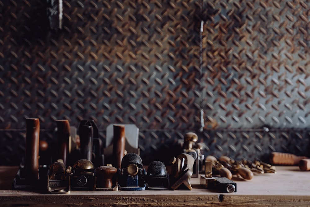 a wooden table topped with lots of different items