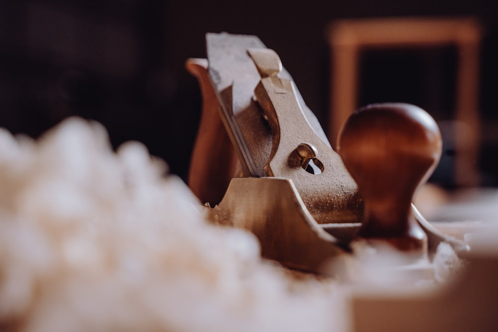 a close up of a wooden object on a table