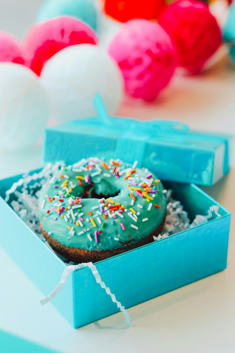 chocolate doughnut with white icing on top