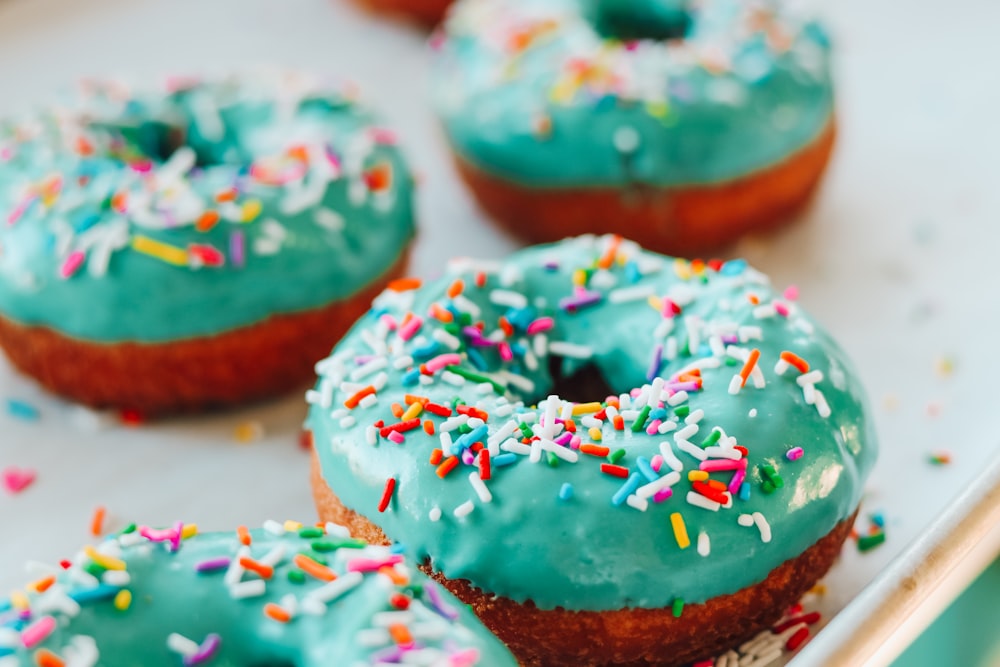 brown doughnut with blue icing on top