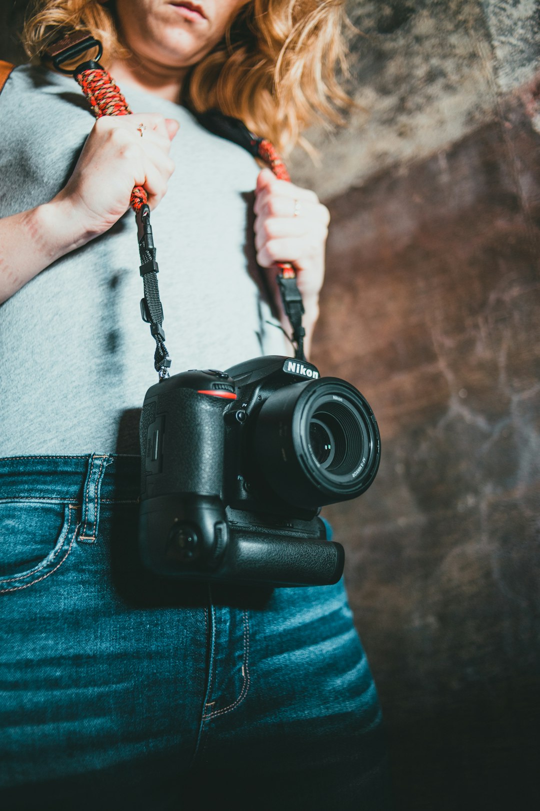 person holding black dslr camera