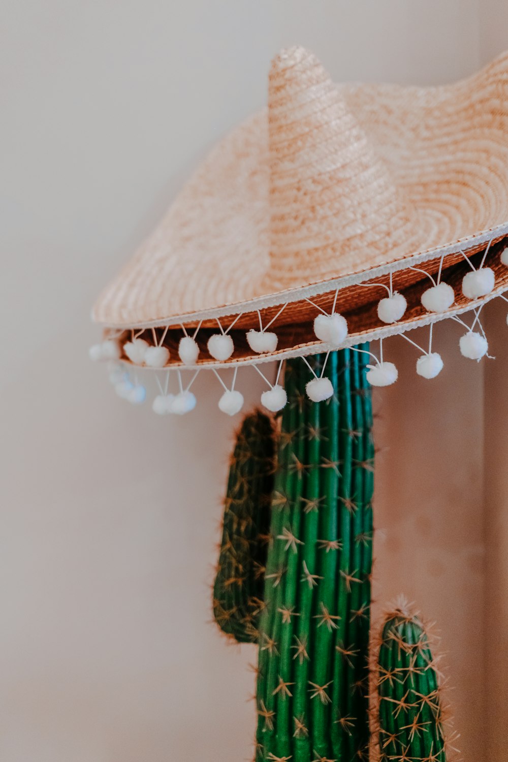 white and brown wicker hat