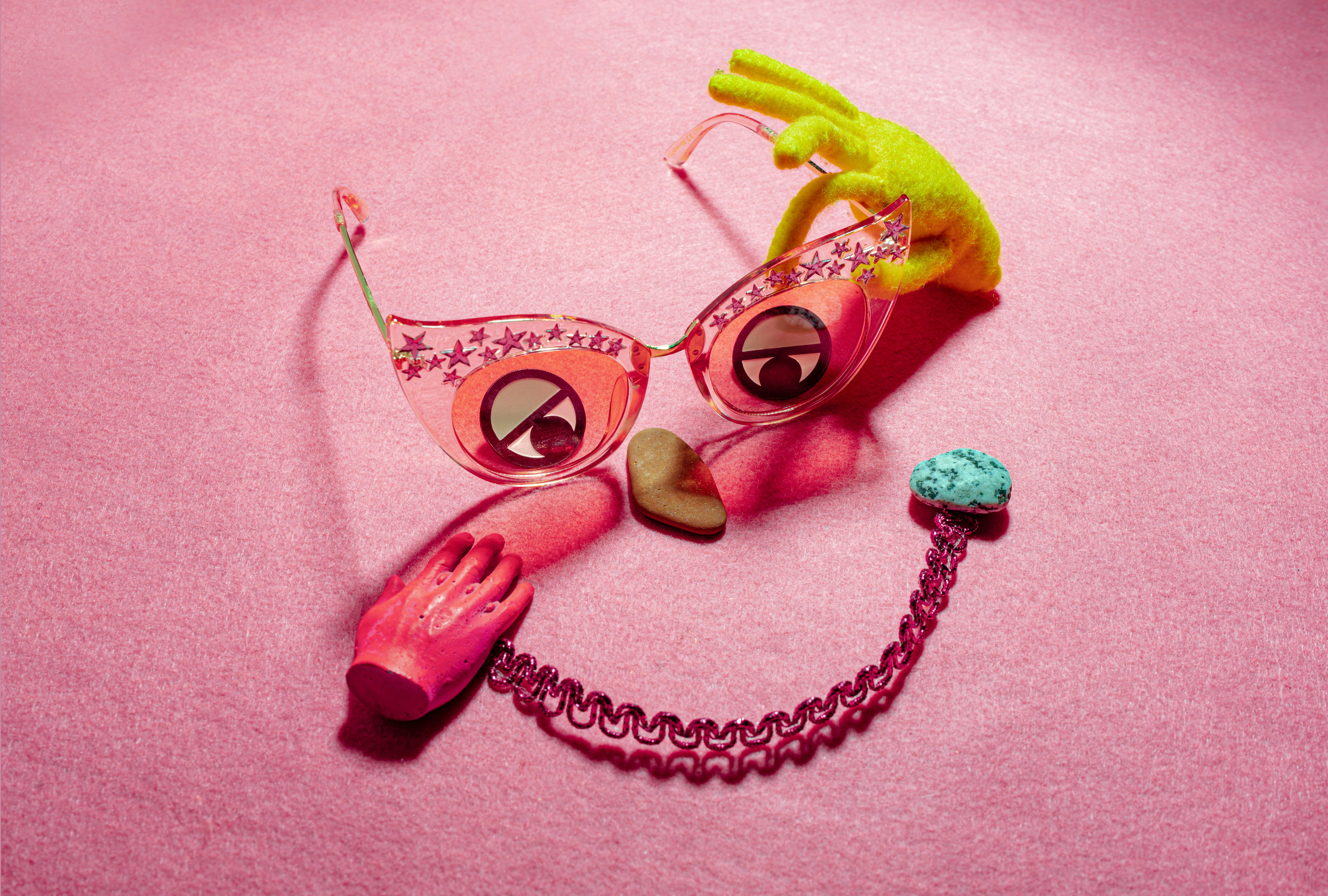 yellow green and pink heart shaped sunglasses