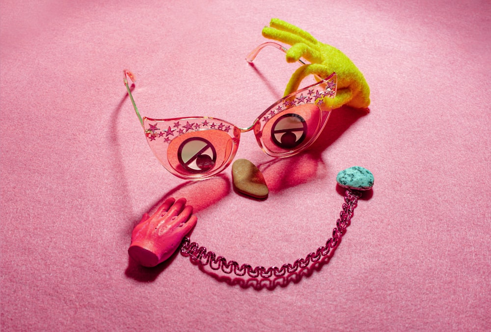 yellow green and pink heart shaped sunglasses