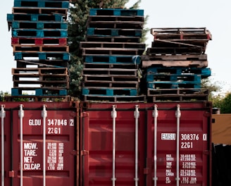 red steel container van under blue sky during daytime