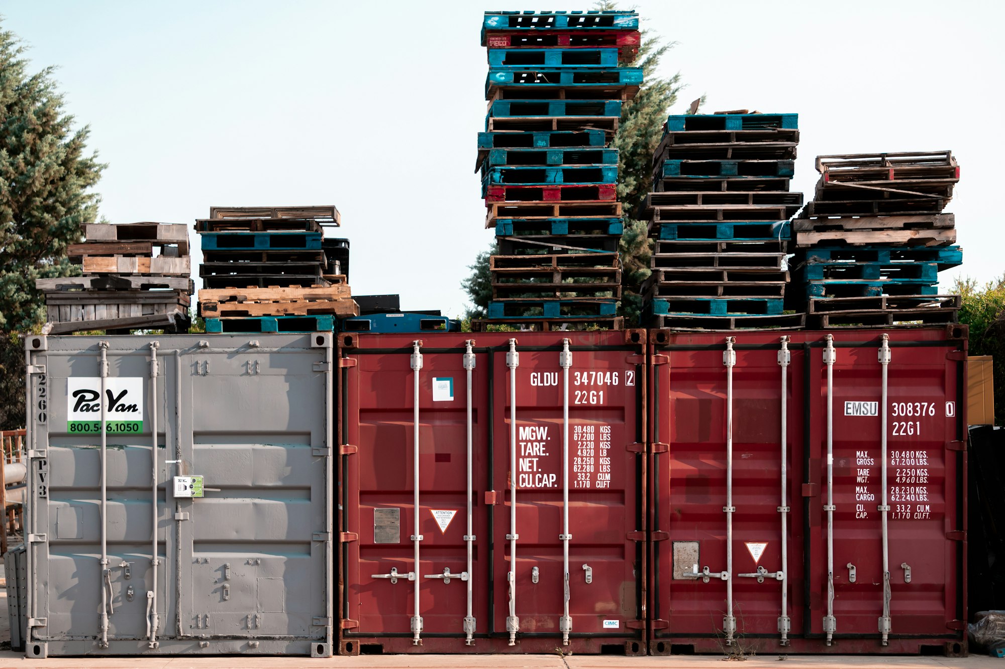 red steel container van under white sky during daytime